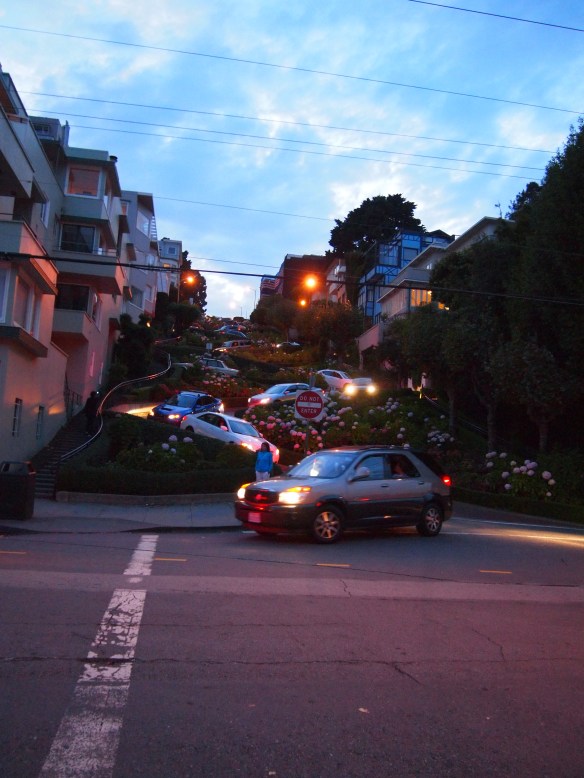 A wide angel lens makes Lombard Street look more compressed and less tall - at this distance there is not a lot of curve distortion.
