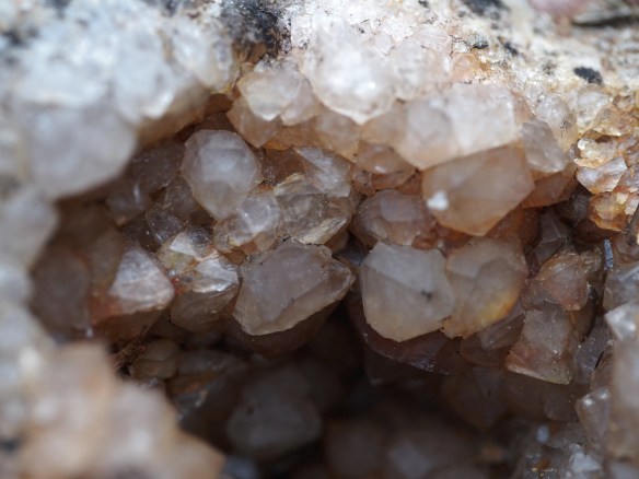 This is a hole in a large rock I have on the patio - it fills with rainwater and the birds drink from this crystalline cavity.