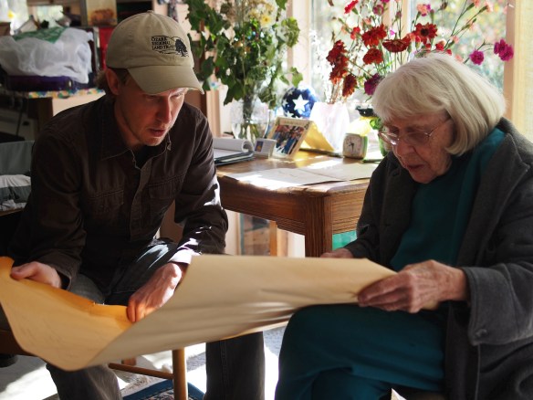 Here Mary Jane reviews the scope of the Oak Hill Wildlife Preserve Land Trust with a surveyor.