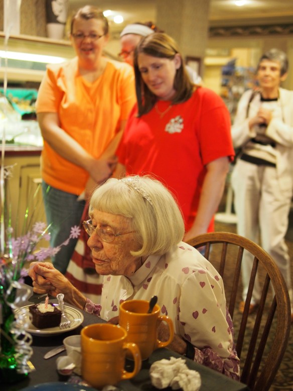 Mary Jane blows out the candles on her 99th birthday surrounded by family and friends.