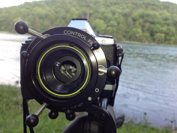 This is my tilt-shift set up - note the aperture ring in the center - its a coated metal disc held in place by magnets. To change the aperture you change out the ring. f22 is like a pinhole. f1.4 is no ring at all.